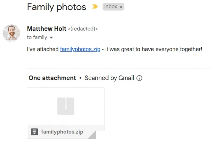 Mail d'un spam utilisant le nom de domaine familyphotos.zip